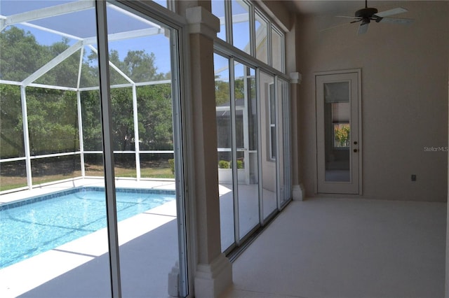view of swimming pool featuring a ceiling fan