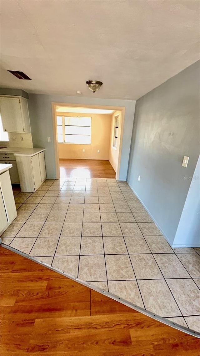 7734 Judith Cres, Port Richey, FL 34668 - interior space with light tile patterned floors