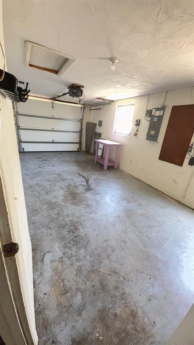 7734 Judith Cres, Port Richey, FL 34668 - garage with a garage door opener and electric panel
