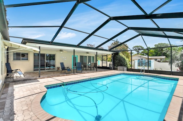 1403 Garden Ave, Tarpon Springs, FL 34689 - swimming pool featuring ceiling fan, a patio area, and a lanai