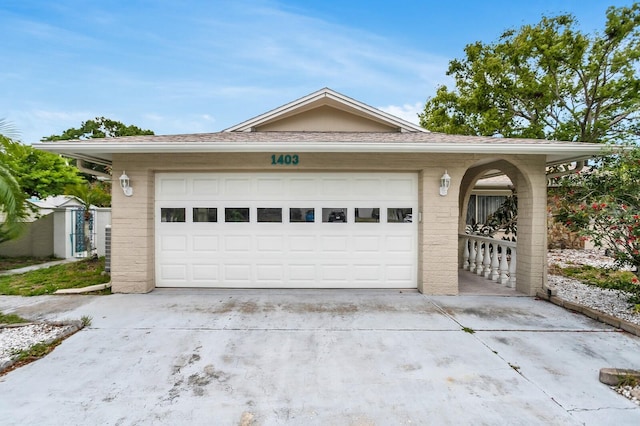 1403 Garden Ave, Tarpon Springs, FL 34689 - garage featuring concrete driveway