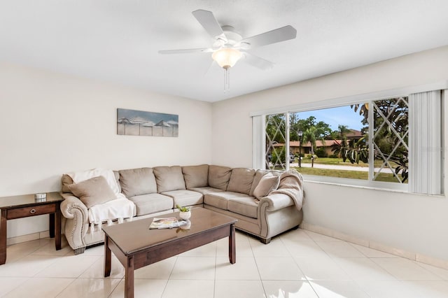 1403 Garden Ave, Tarpon Springs, FL 34689 - living area with ceiling fan and baseboards