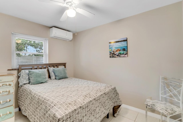 1403 Garden Ave, Tarpon Springs, FL 34689 - bedroom featuring a wall mounted air conditioner, light tile patterned floors, baseboards, and ceiling fan