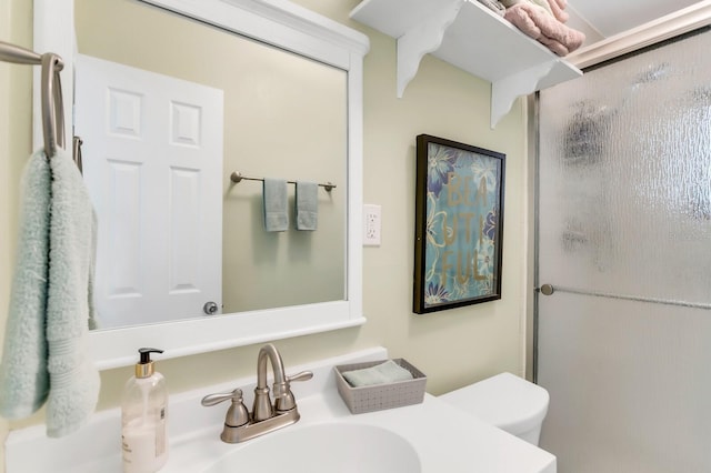 1403 Garden Ave, Tarpon Springs, FL 34689 - full bathroom featuring a shower stall, toilet, and vanity