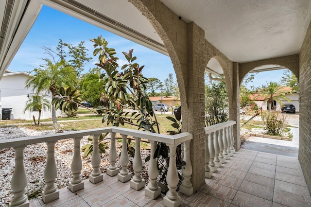 1403 Garden Ave, Tarpon Springs, FL 34689 - balcony with covered porch