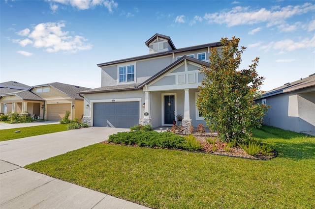 4808 Jackson Club Loop, Tampa, FL 33624 - craftsman house featuring stucco siding, driveway, a front lawn, and an attached garage