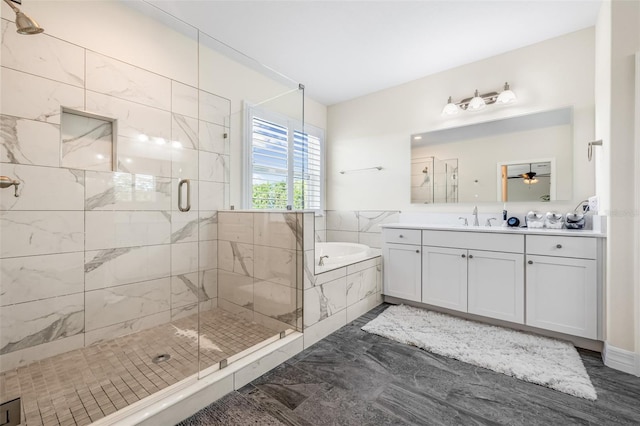 4808 Jackson Club Loop, Tampa, FL 33624 - full bathroom with marble look tile flooring, a garden tub, vanity, a stall shower, and ceiling fan