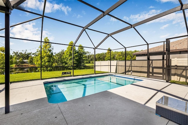4808 Jackson Club Loop, Tampa, FL 33624 - view of swimming pool featuring a patio area, a lawn, and a lanai