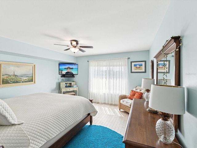 bedroom featuring ceiling fan and wood finished floors