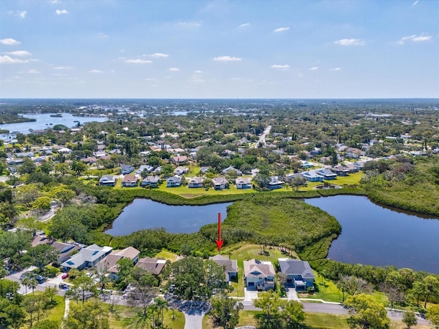 aerial view featuring a residential view and a water view