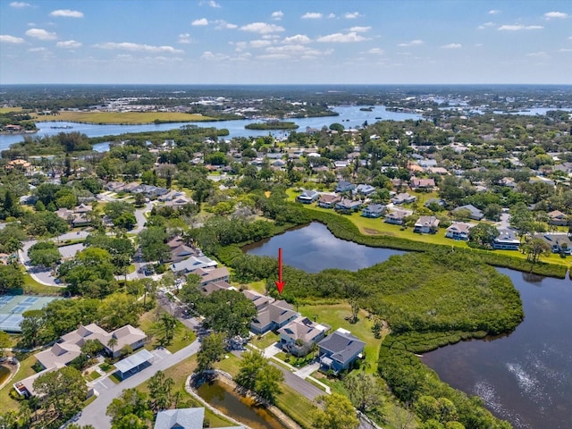 aerial view featuring a residential view and a water view