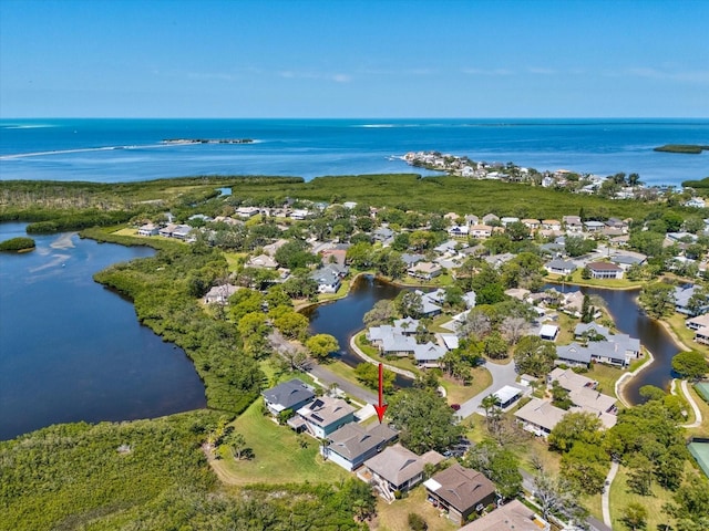 bird's eye view with a residential view and a water view