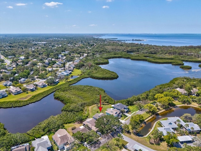 bird's eye view with a water view and a residential view
