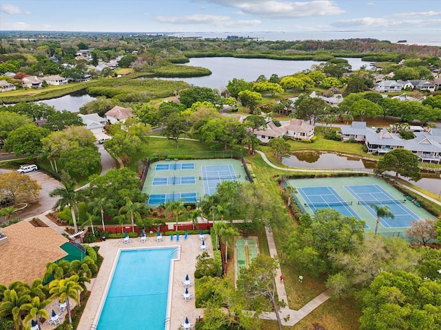 drone / aerial view with a water view and a residential view