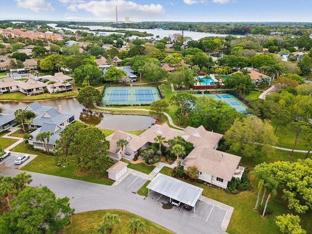 bird's eye view with a residential view and a water view