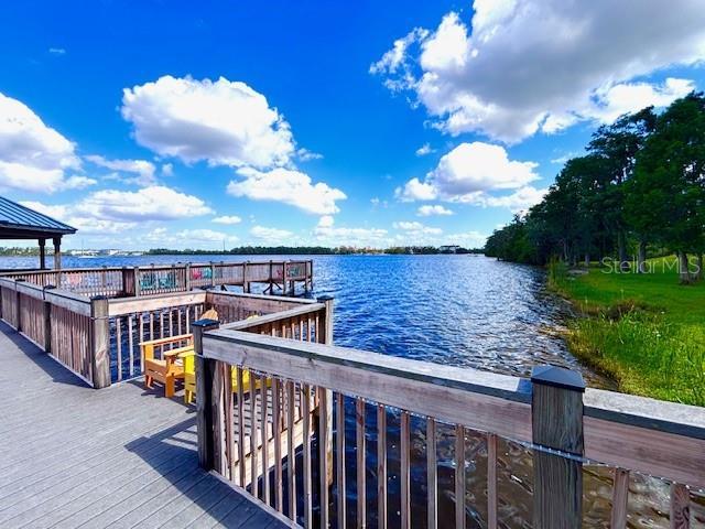 13415 Blue Heron Beach Dr Unit 1006, Orlando, FL 32821 - view of dock with a water view
