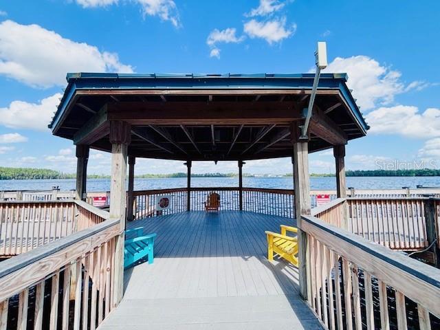 13415 Blue Heron Beach Dr Unit 1006, Orlando, FL 32821 - dock area featuring a water view