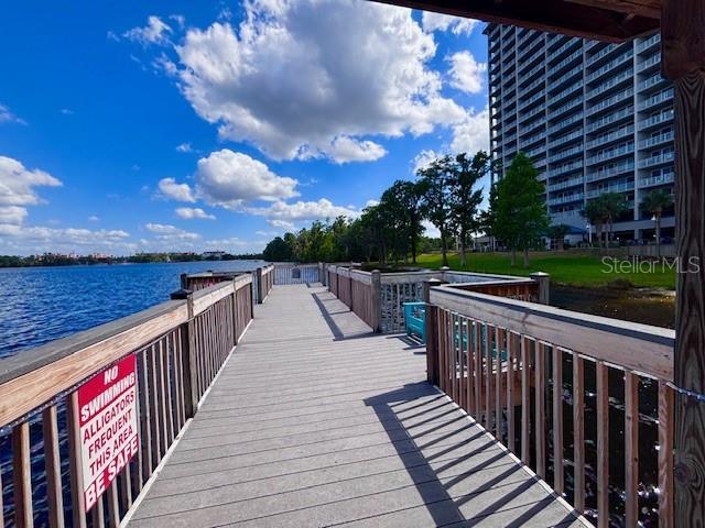 13415 Blue Heron Beach Dr Unit 1006, Orlando, FL 32821 - view of dock with a water view