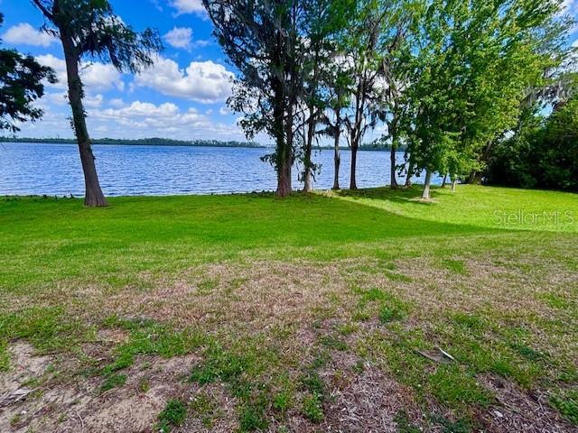 13415 Blue Heron Beach Dr Unit 1006, Orlando, FL 32821 - view of yard with a water view