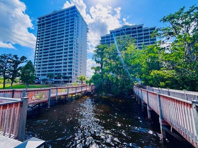 13415 Blue Heron Beach Dr Unit 1006, Orlando, FL 32821 - view of dock with a water view