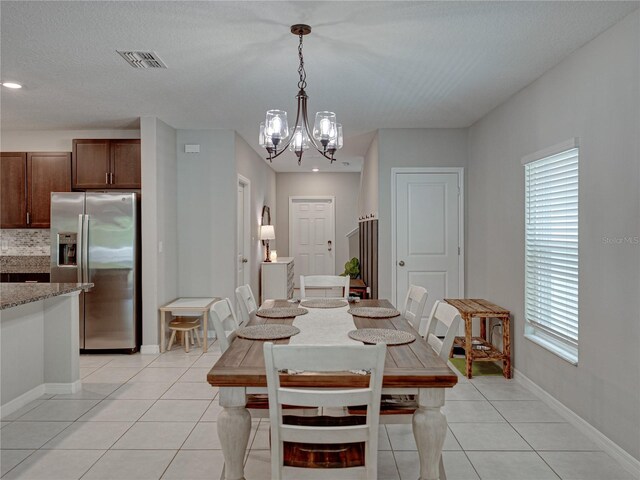 413 Royal Empress Dr, Ruskin, FL 33570 - dining area featuring light tile patterned floors, a chandelier, baseboards, and recessed lighting
