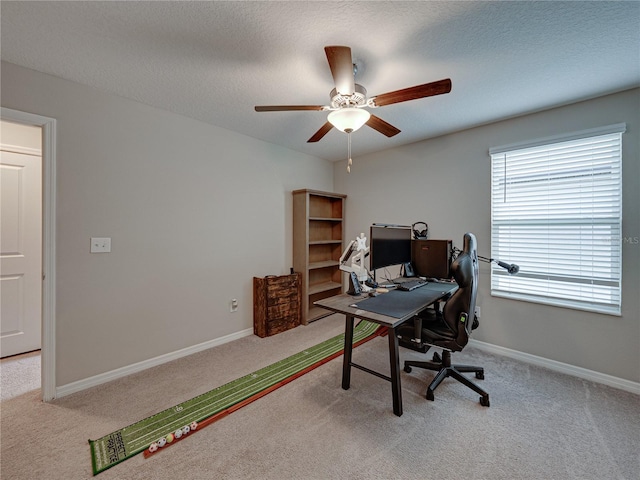 413 Royal Empress Dr, Ruskin, FL 33570 - office with carpet flooring, ceiling fan, baseboards, and a textured ceiling
