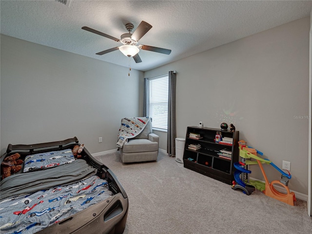 413 Royal Empress Dr, Ruskin, FL 33570 - carpeted bedroom featuring a ceiling fan, a textured ceiling, and baseboards