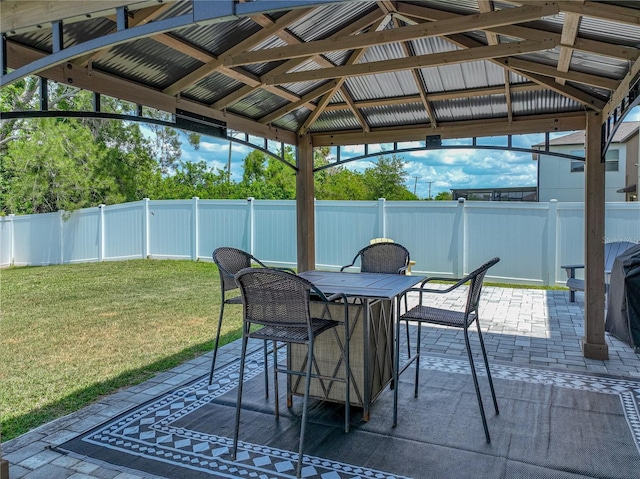 413 Royal Empress Dr, Ruskin, FL 33570 - view of patio featuring a gazebo and outdoor dining space
