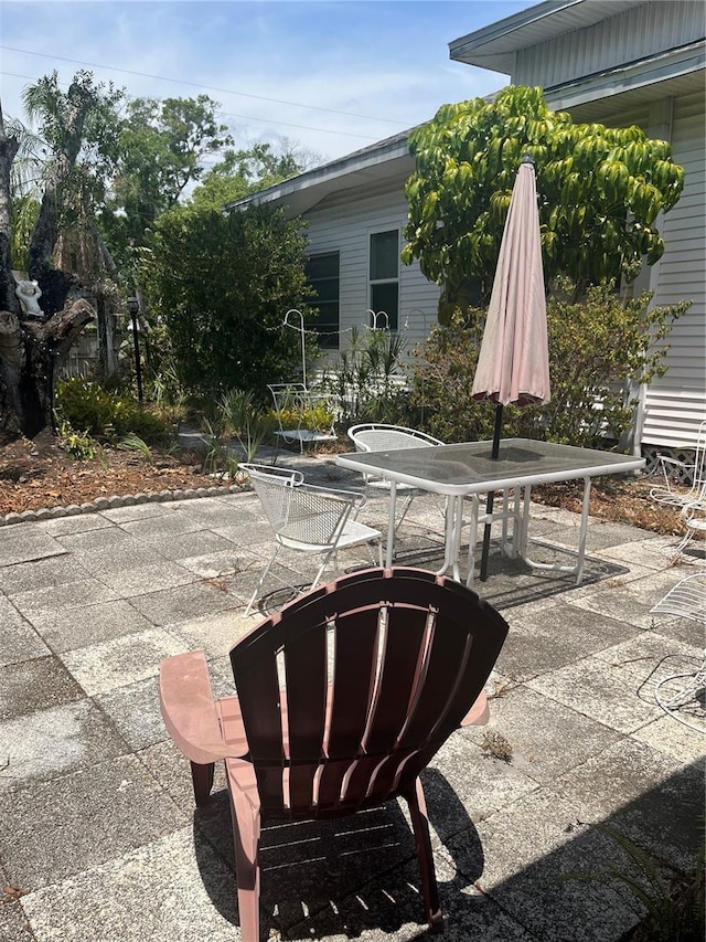 view of patio with outdoor dining area