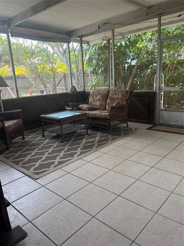 sunroom with outdoor lounge area