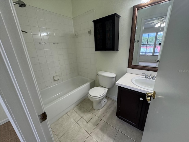 6405 Osprey Lake Cir, Riverview, FL 33578 - full bath with bathtub / shower combination, vanity, tile patterned floors, baseboards, and toilet