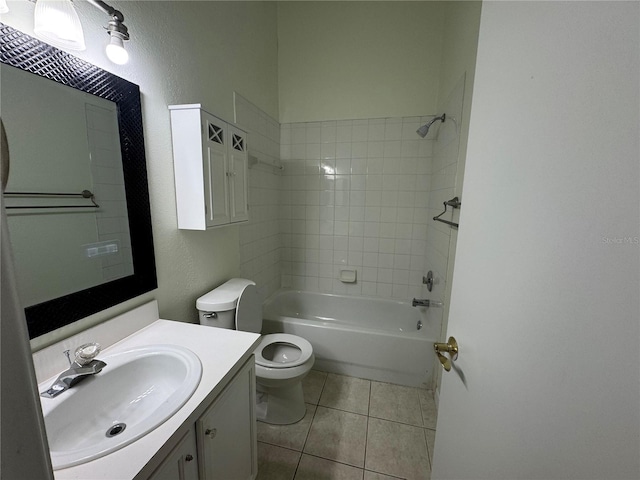 6405 Osprey Lake Cir, Riverview, FL 33578 - full bathroom featuring tile patterned floors, vanity, toilet, bathing tub / shower combination, and a textured wall