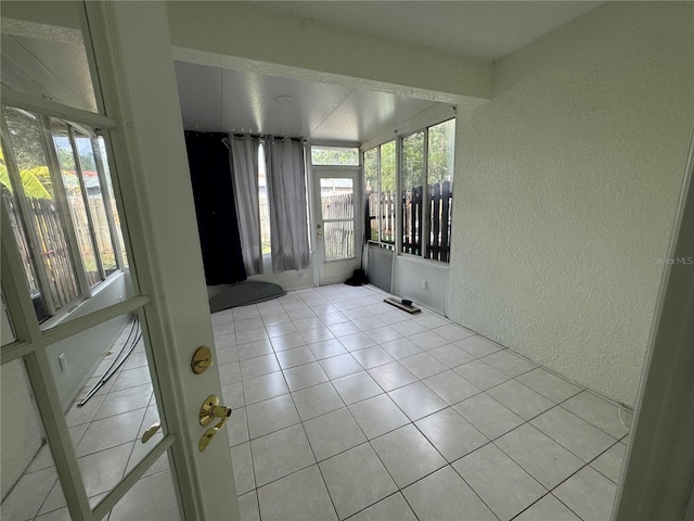 6405 Osprey Lake Cir, Riverview, FL 33578 - unfurnished room featuring a textured wall and tile patterned floors