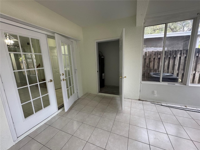 6405 Osprey Lake Cir, Riverview, FL 33578 - unfurnished sunroom featuring french doors