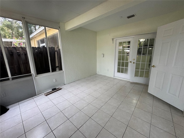 6405 Osprey Lake Cir, Riverview, FL 33578 - unfurnished sunroom featuring beamed ceiling, visible vents, and french doors