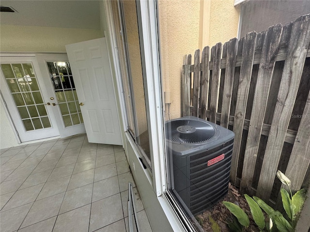 6405 Osprey Lake Cir, Riverview, FL 33578 - exterior details with central AC unit, visible vents, and french doors