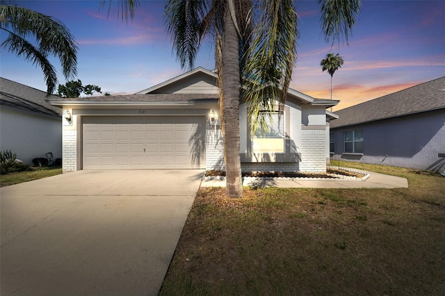 518 Royal Ridge St, Valrico, FL 33594 - view of front of home with concrete driveway, brick siding, and an attached garage