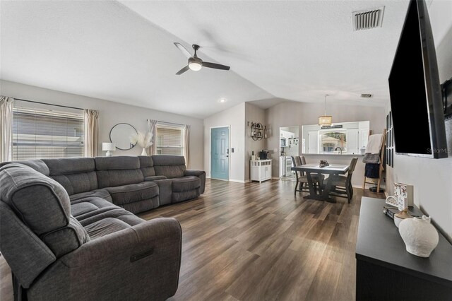 518 Royal Ridge St, Valrico, FL 33594 - living room featuring ceiling fan, visible vents, baseboards, dark wood-style floors, and lofted ceiling
