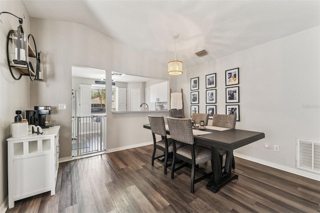 518 Royal Ridge St, Valrico, FL 33594 - dining room with dark wood-type flooring, baseboards, and visible vents