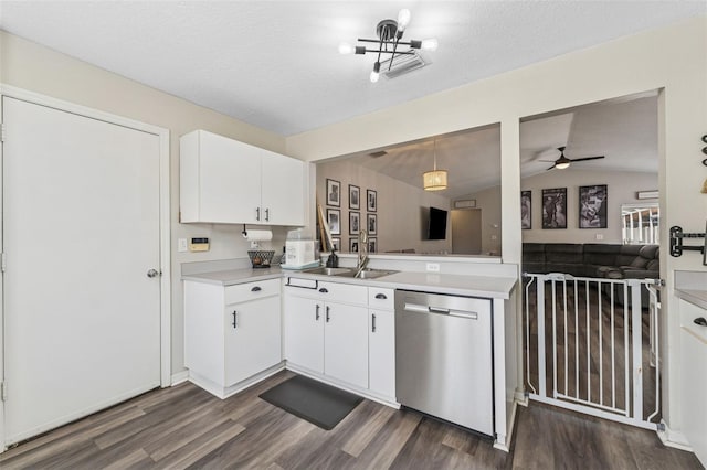518 Royal Ridge St, Valrico, FL 33594 - kitchen featuring white cabinets, a sink, light countertops, dark wood-type flooring, and stainless steel dishwasher