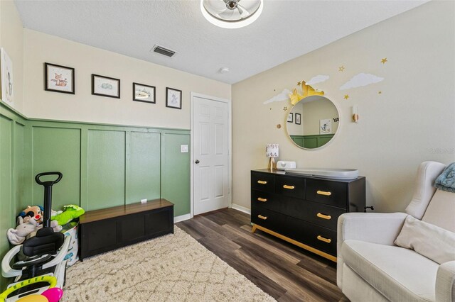 518 Royal Ridge St, Valrico, FL 33594 - sitting room featuring visible vents, dark wood-style flooring, and wainscoting