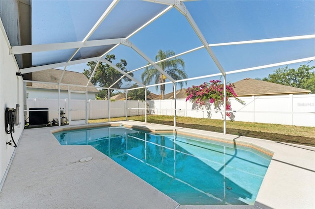 518 Royal Ridge St, Valrico, FL 33594 - view of swimming pool with a fenced in pool, a fenced backyard, a patio area, and cooling unit