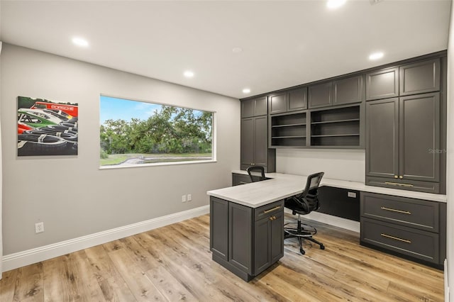 office with baseboards, recessed lighting, and light wood finished floors