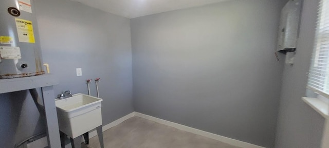 bathroom featuring baseboards and vanity