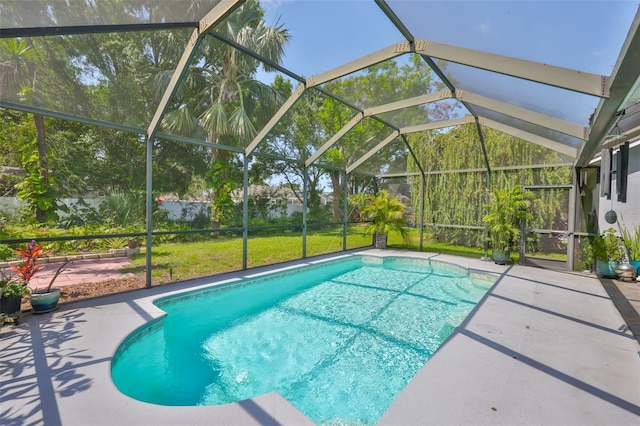 outdoor pool featuring a patio and a lanai