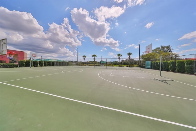 view of sport court with fence and community basketball court