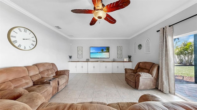 living area with ceiling fan, visible vents, ornamental molding, and a wealth of natural light