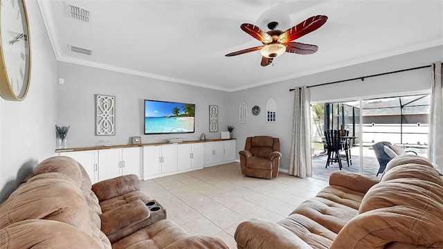 living room featuring ceiling fan, ornamental molding, light tile patterned flooring, and visible vents