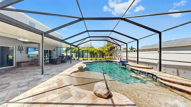 view of swimming pool featuring glass enclosure, a fenced in pool, outdoor dining area, and a patio area
