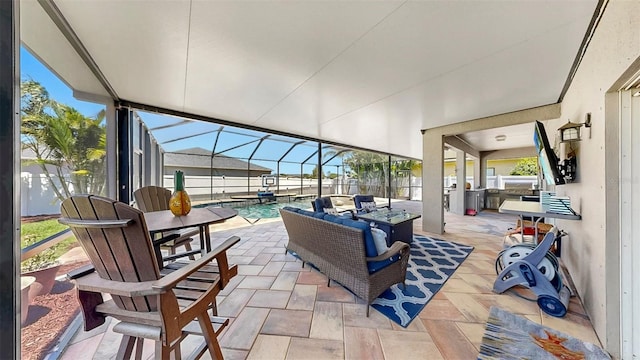view of patio featuring glass enclosure, fence, and a fenced in pool